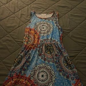 Multi colored women's maxi dress with side pockets.